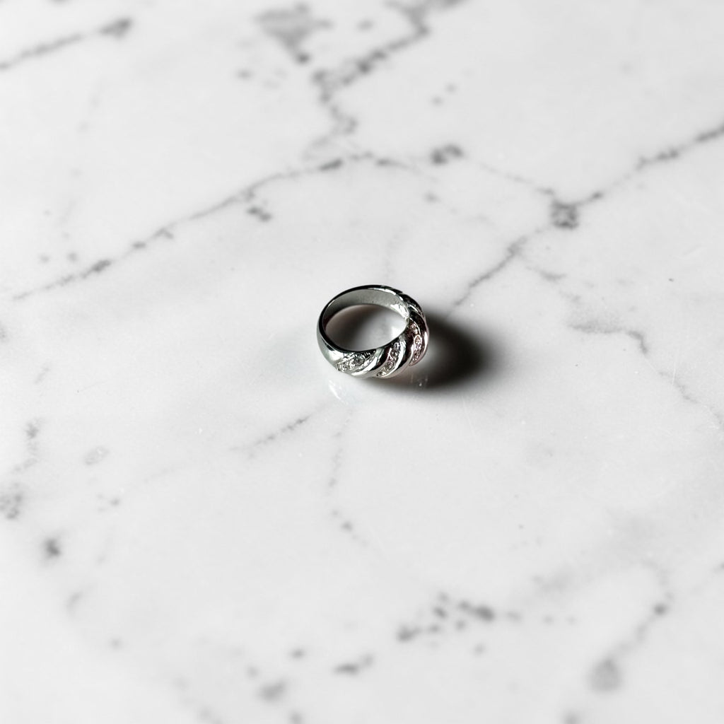 Twisted cubic ring